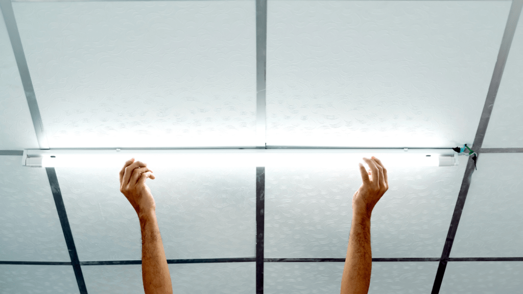 a person holding a led light