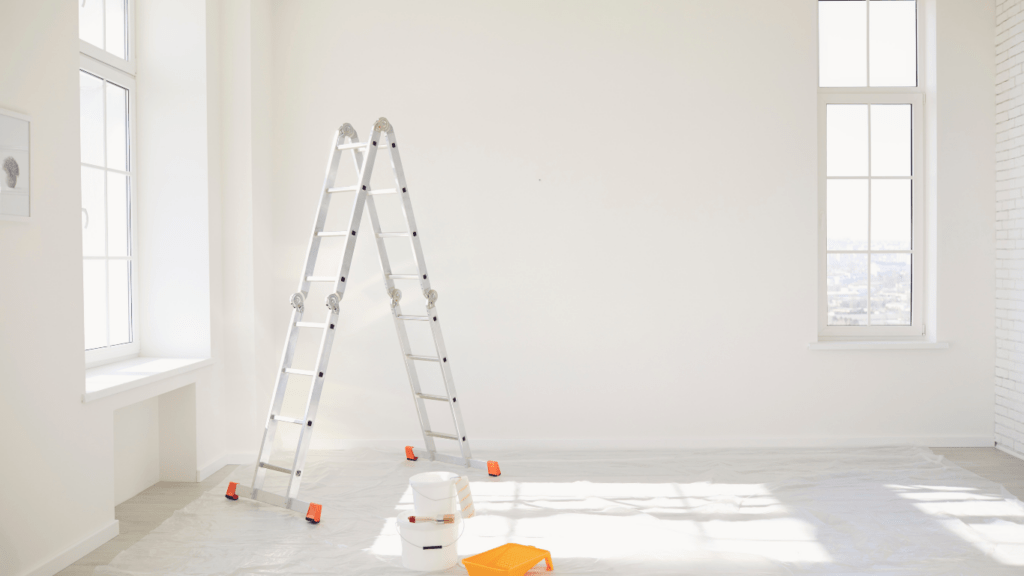 a room that is being remodeled with a ladder and other tools