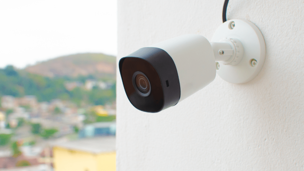 a security camera mounted on the side of a building