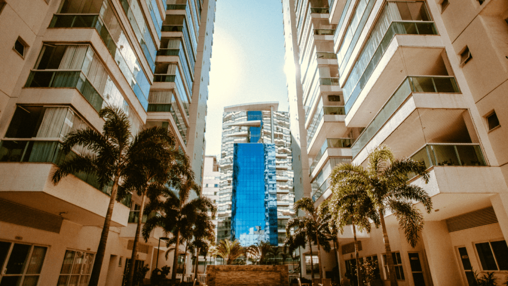 an aerial view of tall buildings in an urban area