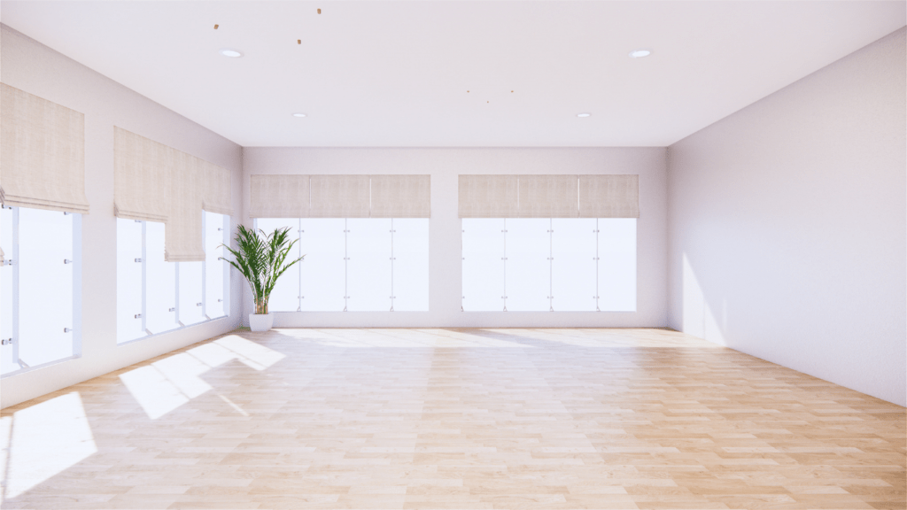 an empty living room with hardwood floors