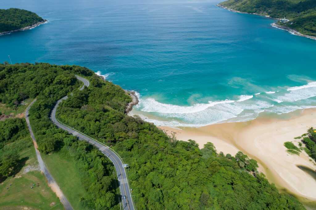 aerial view curve road along naiharn beach phuket thailand beautiful sandy beach open sea summer season nature recovered environment travel background